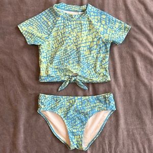 Girls two-piece rash guard swimsuit by Zella.